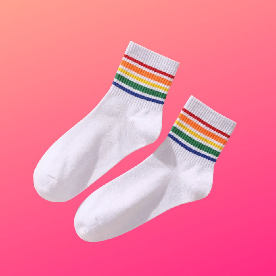 A pair of rainbow-bedecked socks