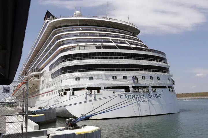 The Carnival cruise line ship Carnival Magic sits docked on April, 2020, in Cape Canaveral, Fla.