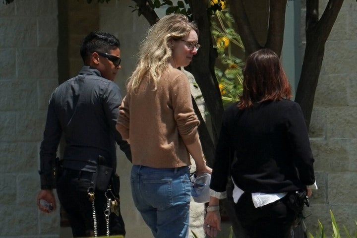 Theranos founder Elizabeth Holmes arrives to begin serving her prison sentence at the Federal Prison Camp in Bryan, Texas.