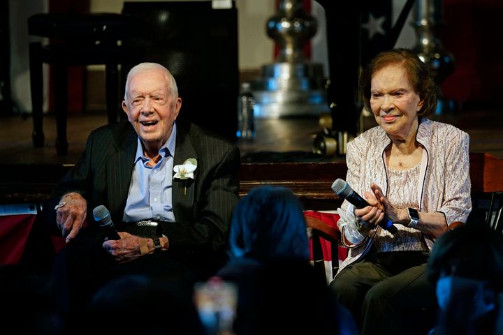 FILE - Former President Jimmy Carter and his wife former first lady Rosalynn Carter sit together during a reception to celebrate their 75th wedding anniversary on July 10, 2021, in Plains, Georgia.