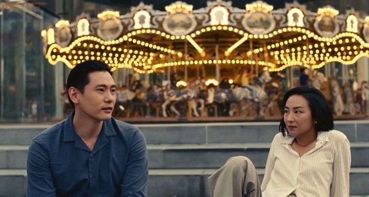 Greta Lee (right) and Teo Yoo star in A24's romantic drama "Past Lives," the feature directorial debut of acclaimed playwright Celine Song.