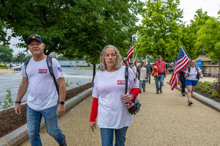 Micki Witthoeft, mother of Ashli Babbitt, stands with supporters as they protest outside the US Capitol on May 29 in Washington, D.C.