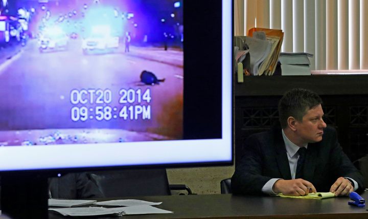 A police vehicle dash cam video of the moments after Laquan McDonald was fatally shot is displayed for jurors, as Chicago police officer Jason Van Dyke attends his first degree murder trial on Oct. 3, 2018, for the shooting death of McDonald.