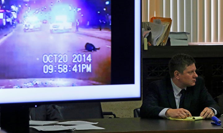 A police vehicle dash cam video of the moments after Laquan McDonald was fatally shot is displayed for jurors, as Chicago police officer Jason Van Dyke attends his first degree murder trial on Oct. 3, 2018, for the shooting death of McDonald.