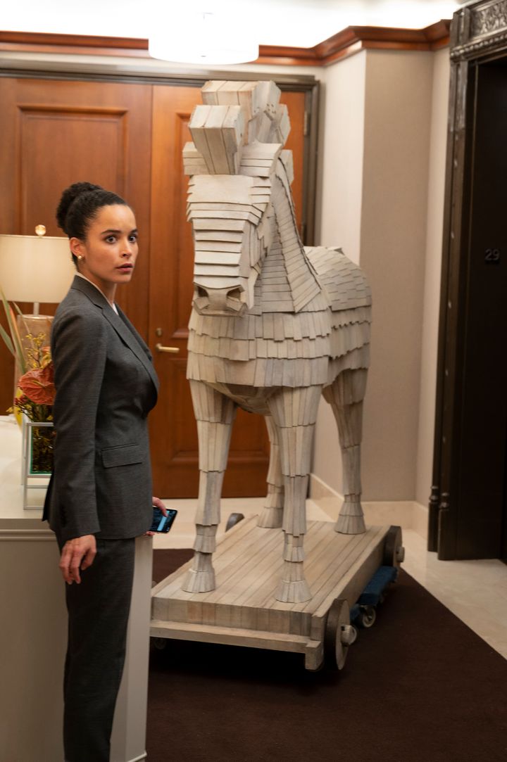 Jess dealing with the delivery of a prank trojan horse from Kendall's frenemy Stewy in Season 3 of HBO's "Succession."