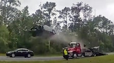 Speeding Sedan Takes Flying Leap Off Georgia Tow Truck Ramp