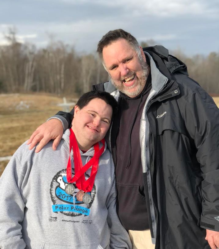 The author with his son John, who won three medals in the snowshoe events at the New York State Special Olympics Winter Games (2018).