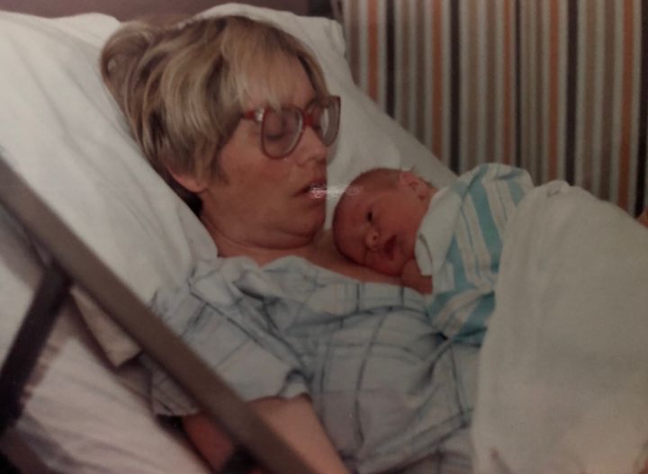John sleeping on his mother Carol's chest the day he was born (1996).