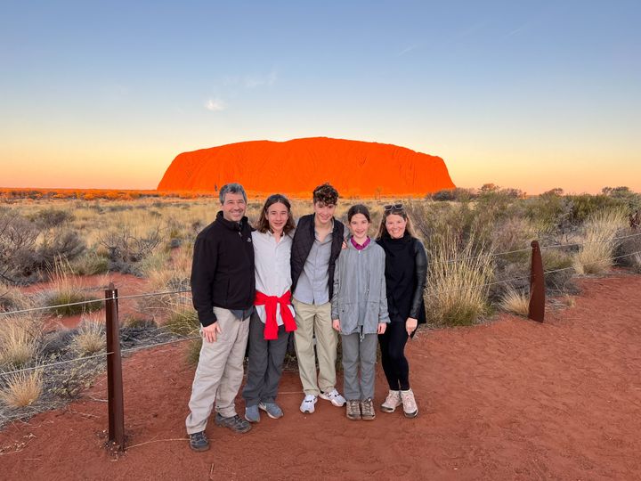 Courtney Hardie and her family in Uluru Kata Tjuṯa National Park in Australia.