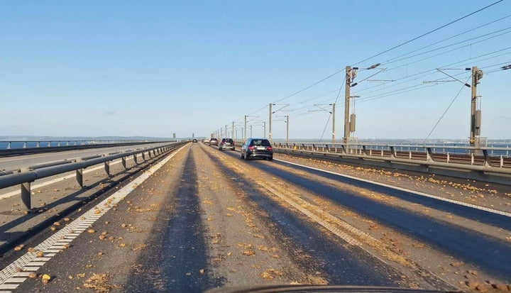 All mashed-up: Potatoes are seen scattered across the carriageway on the western part of the Great Belt Bridge, Denmark, Thursday, June 1, 2023.