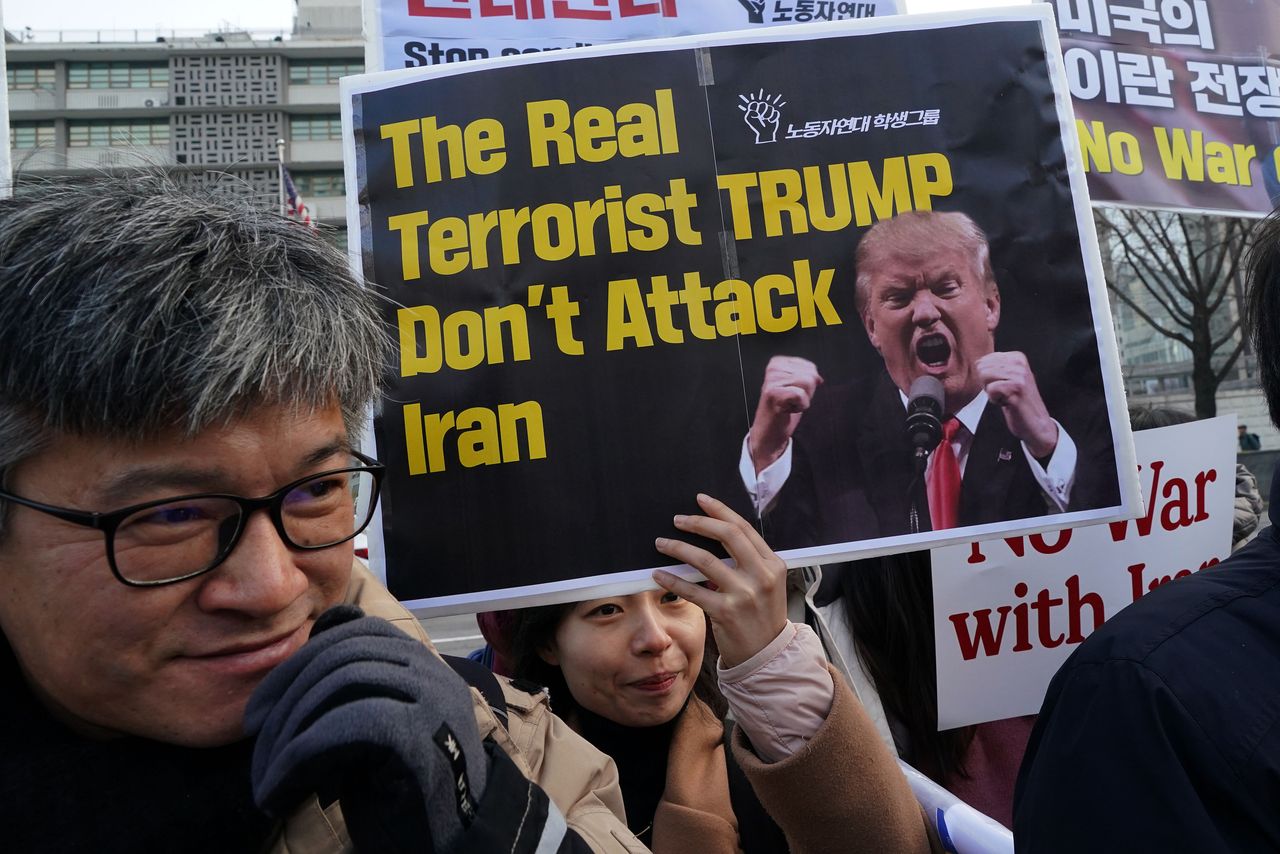 Trump's killing of Iranian general Qassem Soleimani in 2020 sparked fears of U.S.-Iran war and ignited protests worldwide, such as this one in Seoul, South Korea.