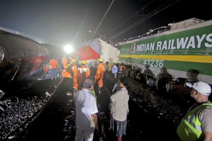 Rescuers work at the site of passenger trains accident, in Balasore district, in the eastern Indian state of Orissa, Saturday, June 3, 2023.Two passenger trains derailed in India, killing more than 200 people and trapping hundreds of others inside more than a dozen damaged rail cars, officials said. (AP Photo)