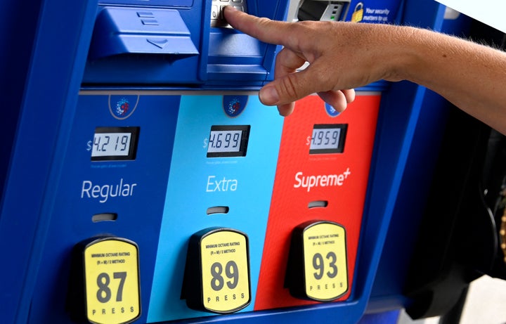 A person uses the keypad on a pump at a gas station on July 29, 2022 in Arlington, Virginia.