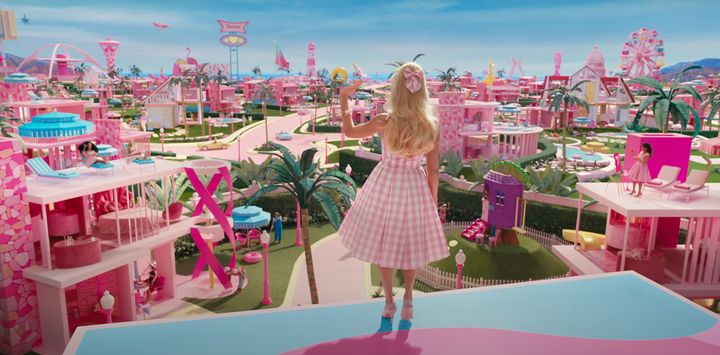 Barbie looks out onto Barbieland in the trailer for the new film