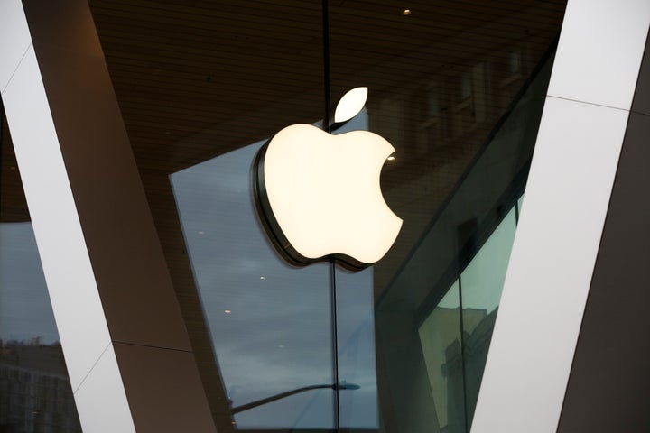 An Apple logo adorns the facade of the downtown Brooklyn Apple store on March 14, 2020, in New York. (AP Photo/Kathy Willens, File)