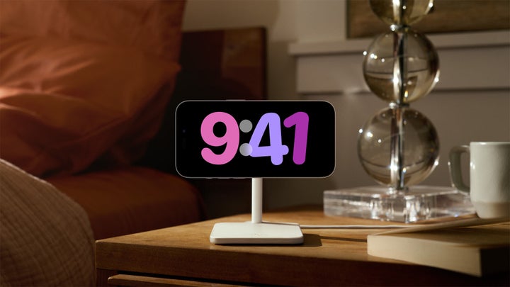 The new StandBy app will share "glanceable" information — such as the time — when your phone is charging on its side.