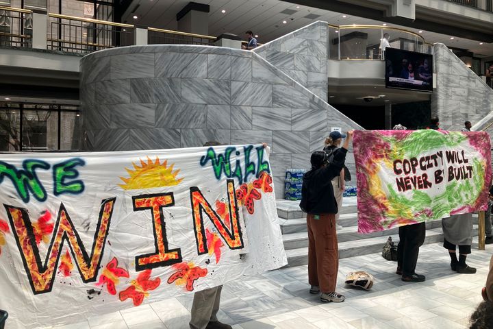 Hundreds of people gather in Atlanta's City Hall on June 5, 2023, to speak ahead of a council vote that approved tens of millions in public funding for the construction of a proposed police and firefighter training center that activists decry as "Cop City."