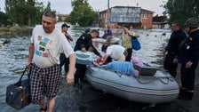  Ukrainians Make Desperate Escape From Floods After Dam Collapse, With Shelling Overhead