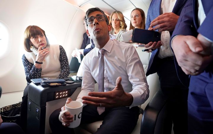 Rishi Sunak speaks to political journalists en route to America.