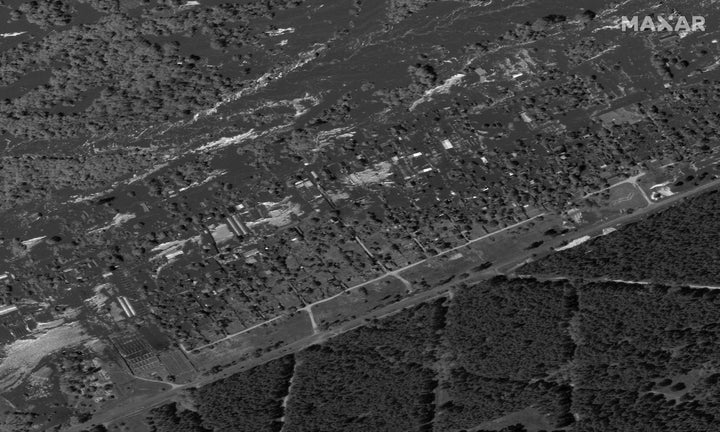 A satellite image shows flooded homes in Krynky, Ukraine, June 6, 2023.