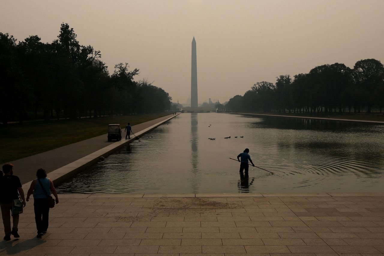 Smoke from wildfires in Canada blankets the Lincoln Memorial Reflecting Pool and the National Mall in Washington, D.C., on Wednesday.