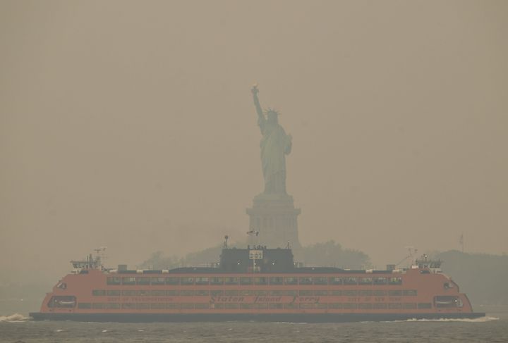 The Manhattan skyline stands shrouded in a reddish haze as a result of Canadian wildfires on June 6, 2023, in New York City. Over 100 wildfires are burning in the Canadian province of Nova Scotia and Quebec resulting in air quality health alerts for the Adirondacks, Eastern Lake Ontario, Central New York and Western New York.