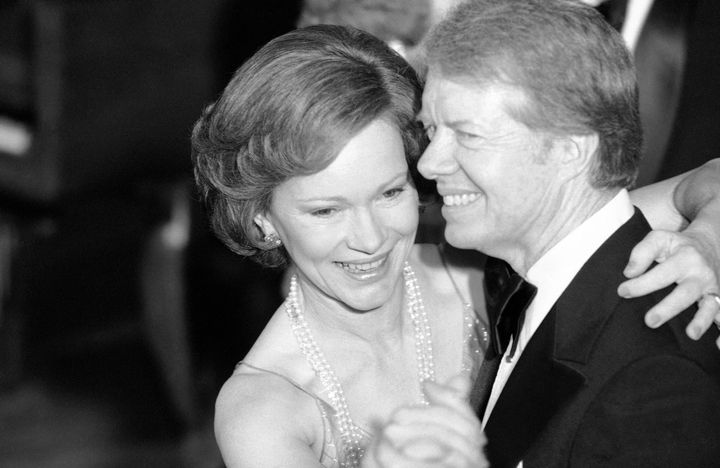 President Jimmy Carter and his wife, Rosalynn Carter, lead their guests in dancing at the annual Congressional Christmas Ball at the White House in Washington on Dec. 13, 1978.