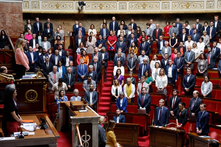 French MPs stand for a minute of silence after a knife attack in Annecy, during a session of questions during a debate in Paris, on June 8, 2023.
