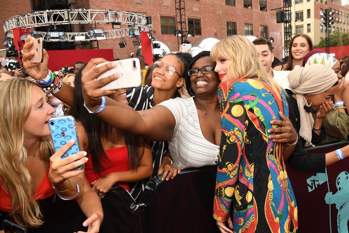 "[Young fans] grew up with her in parallel, even if not really intersecting in real life very often," said psychiatrist (and Swiftie) Jessi Gold.