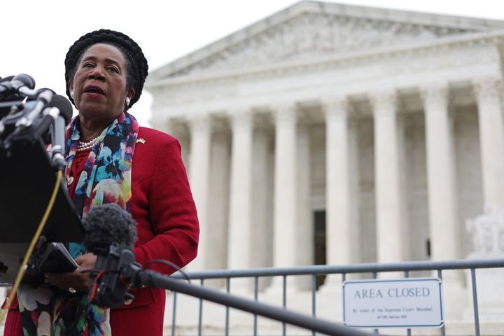 Rep. Sheila Jackson-Lee (D-Texas) speaks to members of the press after the oral argument of the Allen v. Milligan case at the Supreme Court.