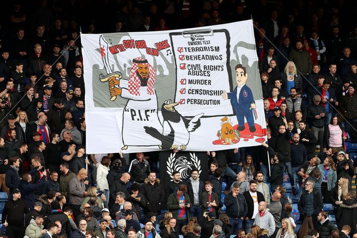 A banner criticizes the Saudi ownership of Newcastle United during a Premier League match between Newcastle and Crystal Palace on Oct. 23, 2021, in London.