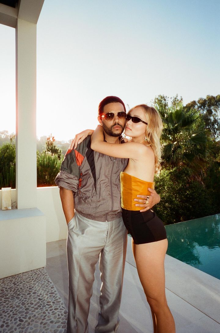Abel Tesfaye and Lily-Rose Depp pose together on the set of The Idol