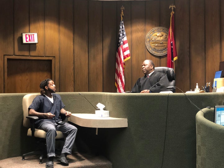 Jermarcus Johnson, left, speaks with Shelby County Criminal Court Judge Lee Coffee as he pleads guilty to charges in the killing of rapper Young Dolph on Friday, June 9, 2023, in Memphis, Tenn. Coffee approved a plea deal with prosecutors, allowing him to avoid trial.(AP Photo/Adrian Sainz)