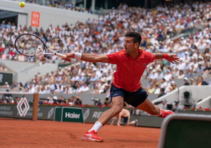 Jun 11, 2023; Paris,France; Novak Djokovic (SRB) returns a shot during the men's singles final against Casper Ruud (NOR) on day 15 at Stade Roland-Garros. Mandatory Credit: Susan Mullane-USA TODAY Sports