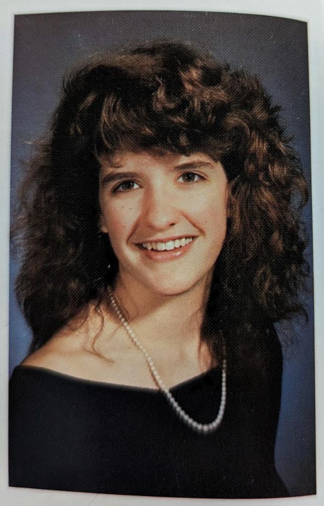 The author in her senior year high school photo. "That's my nervous Prozac smile," she writes.