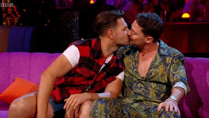 Ollie and Dan share a kiss during the I Kissed A Boy reunion