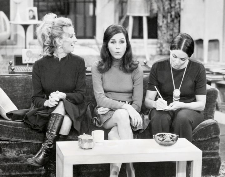 In this episode of "The Mary Tyler Moore Show," Mary Tyler Moore plays Mary Richards, who becomes depressed when a messenger boy calls her "ma'am." As a result, she plans a cheer-up party with her friend Rhoda Gerard, played by Valerie Harper (right). Cloris Leachman's character Phyllis Lindstrom (left) looks on in amusement during the taping of the episode, "Today I Am a Ma'am."