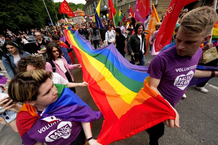 Participants hold a giant rainbow-coloured flag during the Baltic Pride march for equality and peace in Vilnius, Lithuania last year.