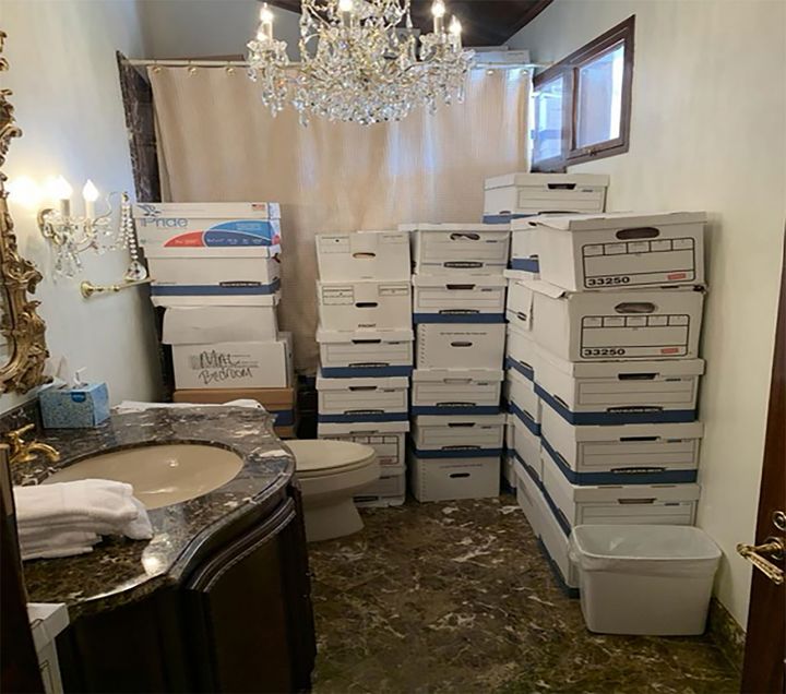 Stacks of boxes in a bathroom and shower in former US president Donald Trump's Mar-a-Lago estate in Palm Beach, Florida.