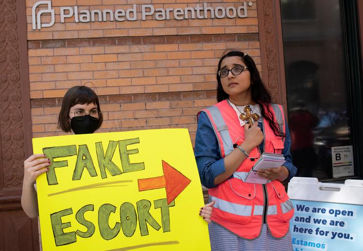 Abortion rights supporters call out anti-abortion tactics at a Planned Parenthood clinic in New York City.