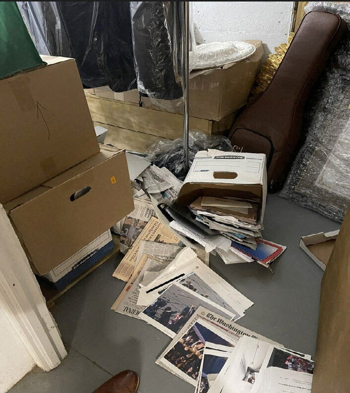 A photo the Justice Department added to its charging document against Donald Trump shows a box of documents, including one classified document, spilled onto the floor of a storeroom at Mar-a-Lago in early 2021. The Justice Department said it edited the image, which it said was taken by Trump's fellow defendant Walt Nauta, to obscure secret information that was visible in the photo.