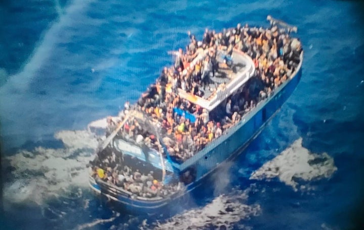 This undated handout image provided by Greece's coast guard on June 14, 2023, shows scores of people covering practically every free stretch of deck on a battered fishing boat that later capsized and sank off southern Greece.