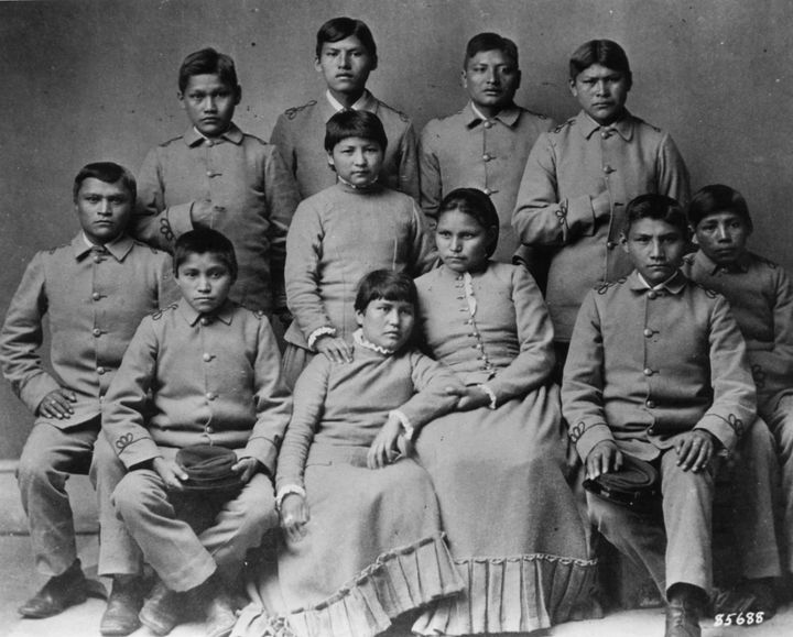 A group of Chiricahua Apaches attending Carlisle Indian School in 1886. Tribal schools like Carlisle were part of a long history of U.S. efforts to destroy Native tribes.