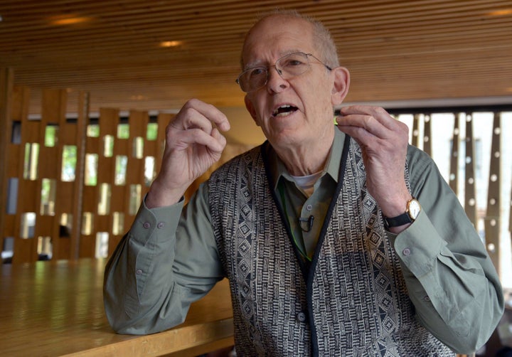 Biologist and environmentalist Roger Payne speaks during an interview with AFP in Bogota, on November 12, 2015. 