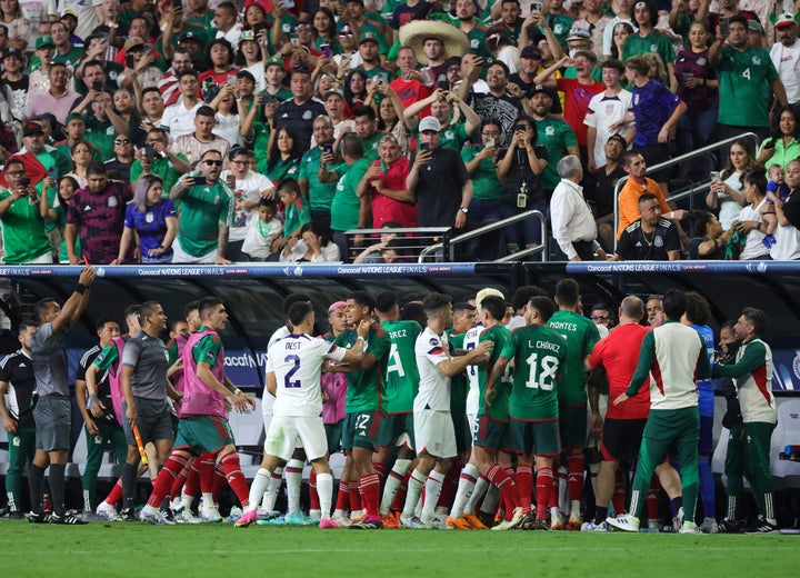 Fans look on as players from Mexico and the United States scuffle during the 2023 CONCACAF Nations League semifinals at Allegiant Stadium on June 15, 2023 in Las Vegas, Nevada. 