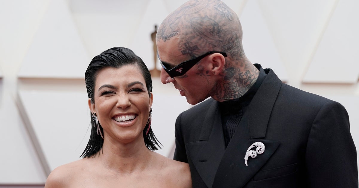 Kourtney Kardashian Reveals She’s Pregnant With Show-Stopping Move At Blink-182 Show