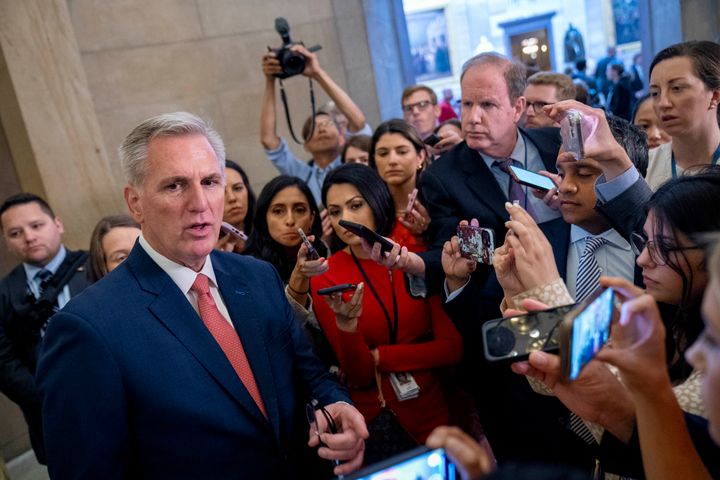 House Speaker Kevin McCarthy (R-Calif.) speaks with reporters. Republicans said McCarthy was clear during negotiations that spending had to come down from current levels. McCarthy argued that the numbers he negotiated with the White House amount to a cap and “you can always do less.”