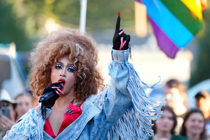 FILE - Lilia performs a Cyndi Lauper song during the RaYnbow Collective hosting a 2022 "Back to School Pride Night" for BYU students at Kiwanis Park in Provo, Utah. In a statement, the city of St. George said it is committed to ensuring public parks and facilities remain viable and open to residents and those who want to hold special events in their community.