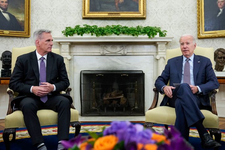 President Joe Biden (right) meets with House Speaker Kevin McCarthy to discuss the debt limit in the Oval Office of the White House on May 22.
