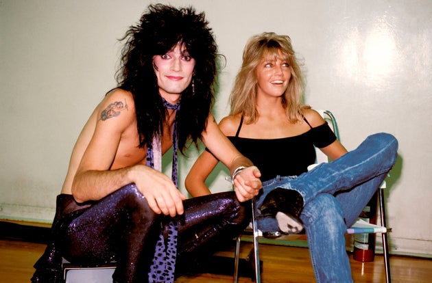 Tommy Lee (left) and Heather Locklear in 1985, about a year before they were married. 